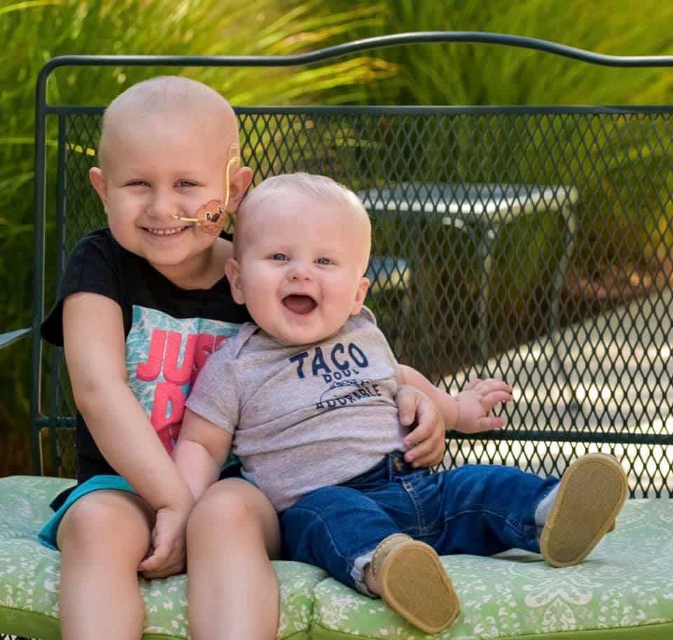 RMHC Sister hugging little brother
